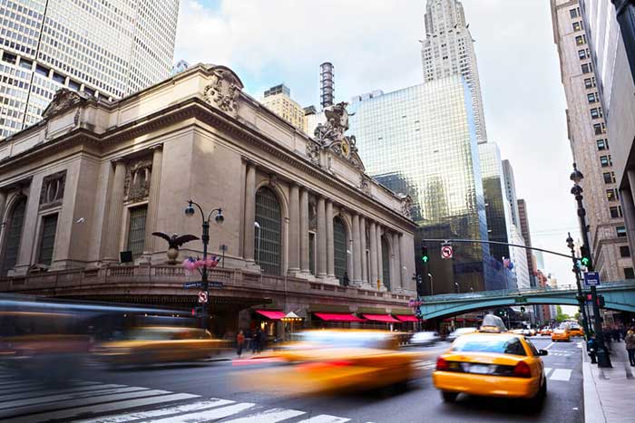 cars speeding through NYC streets