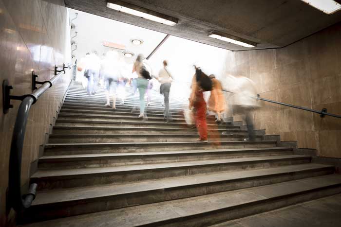 interior of a modern station, blurred people