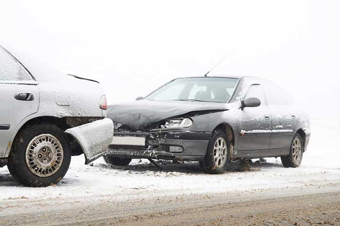 Cars clash in the snow in Brooklyn, NY